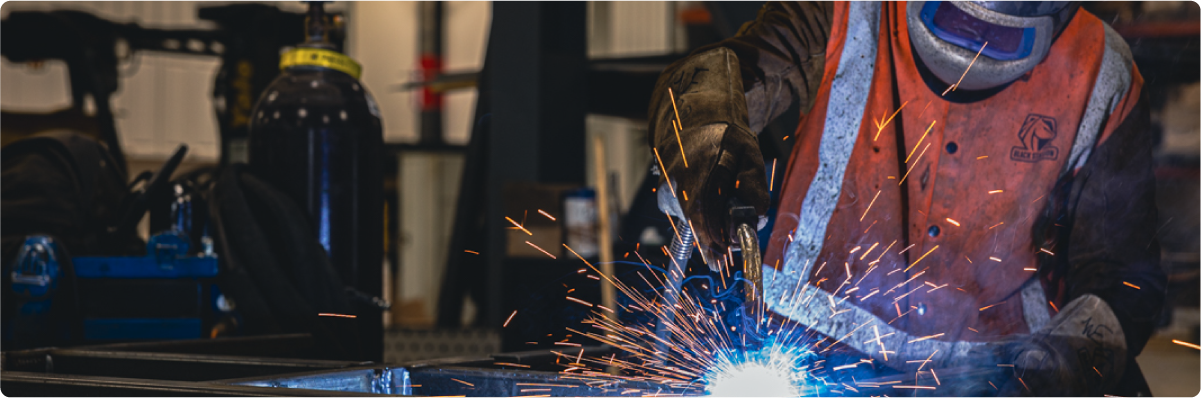 Person Welding Steel